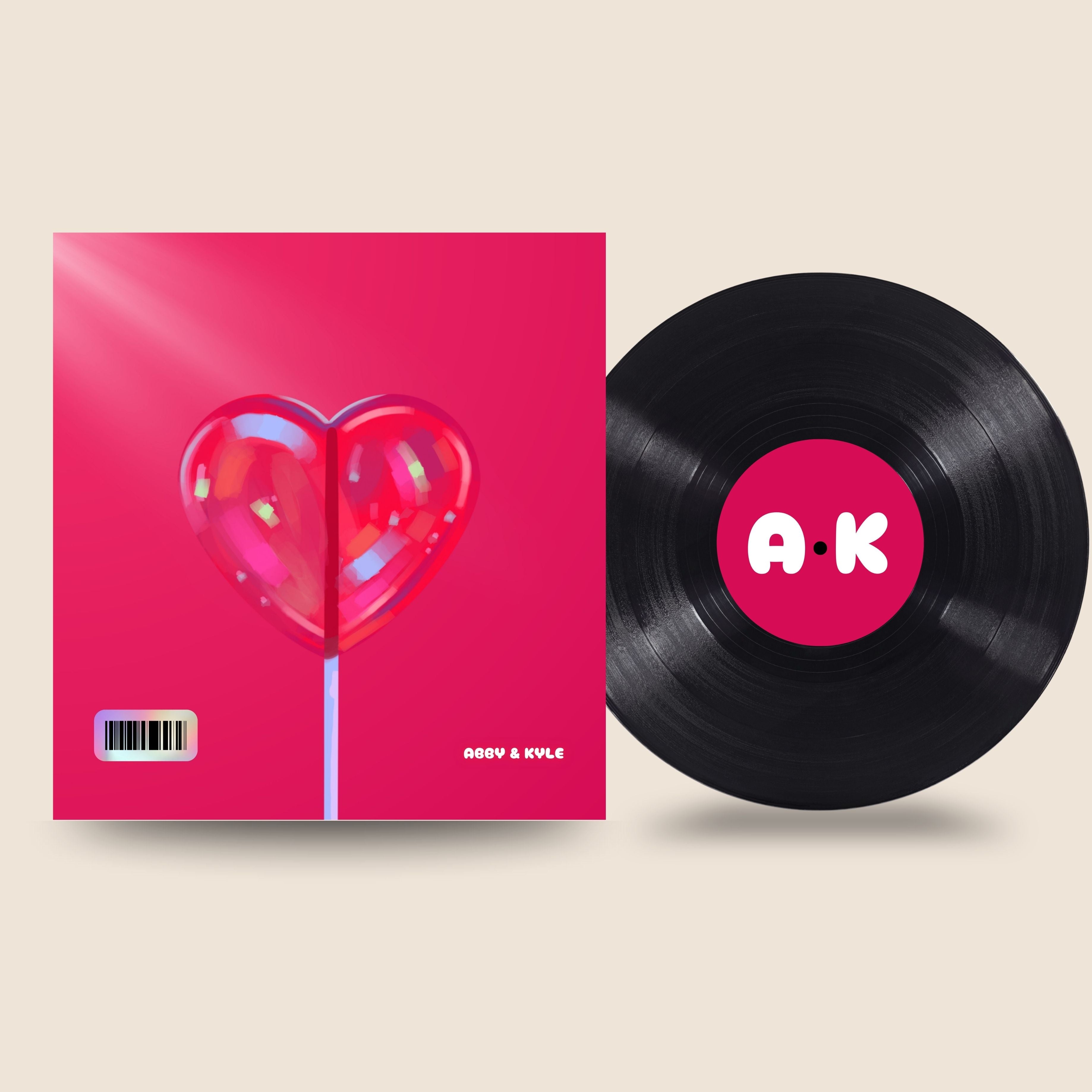 12″ Custom Mixtape Vinyl Record – Classic Edition by Black Label Vinyl featuring a classic black 12-inch lathe-cut record with a custom pink center label, shown alongside a bold heart-themed album cover with personalized initials.