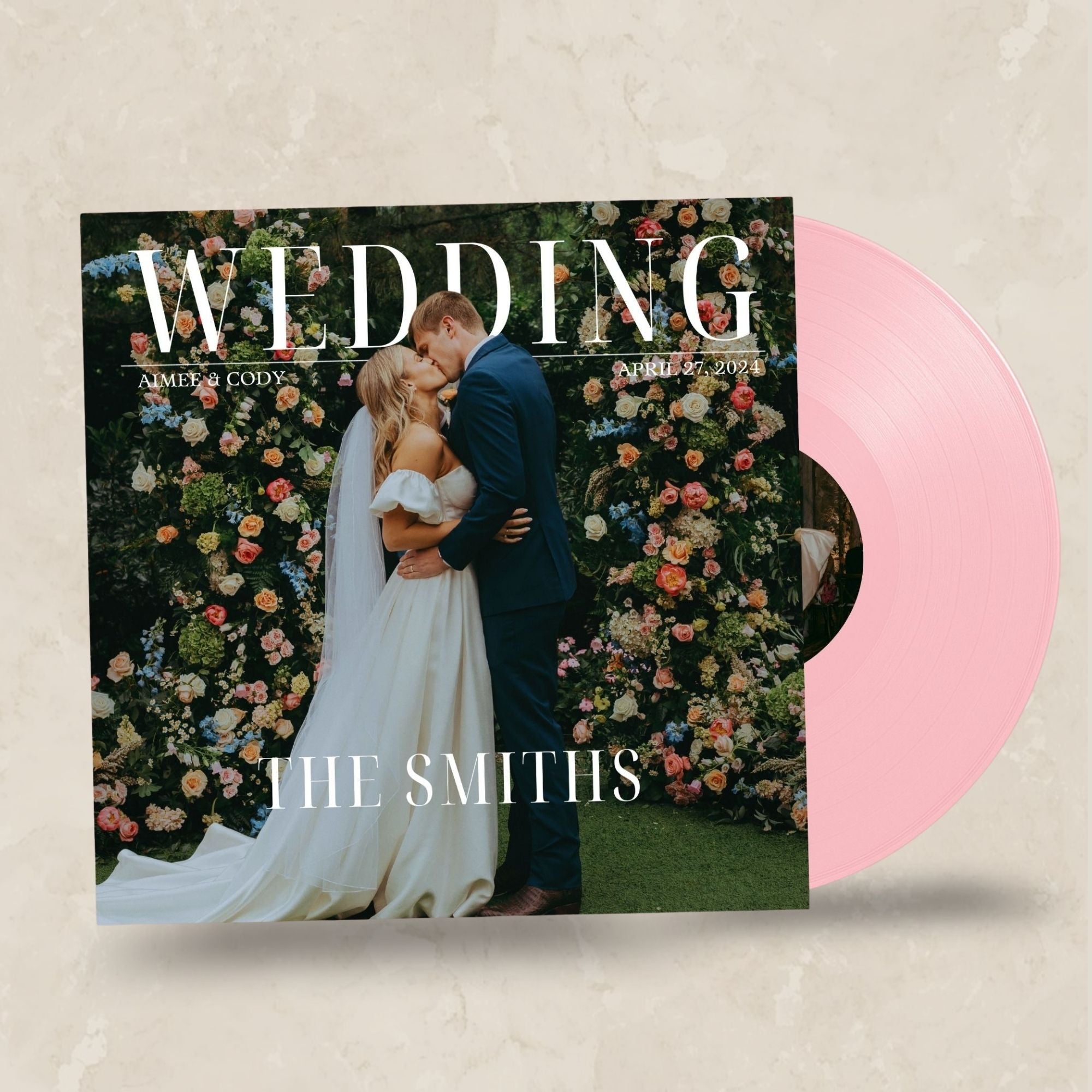 Vinyl record cover with a wedding theme featuring a couple and floral background.