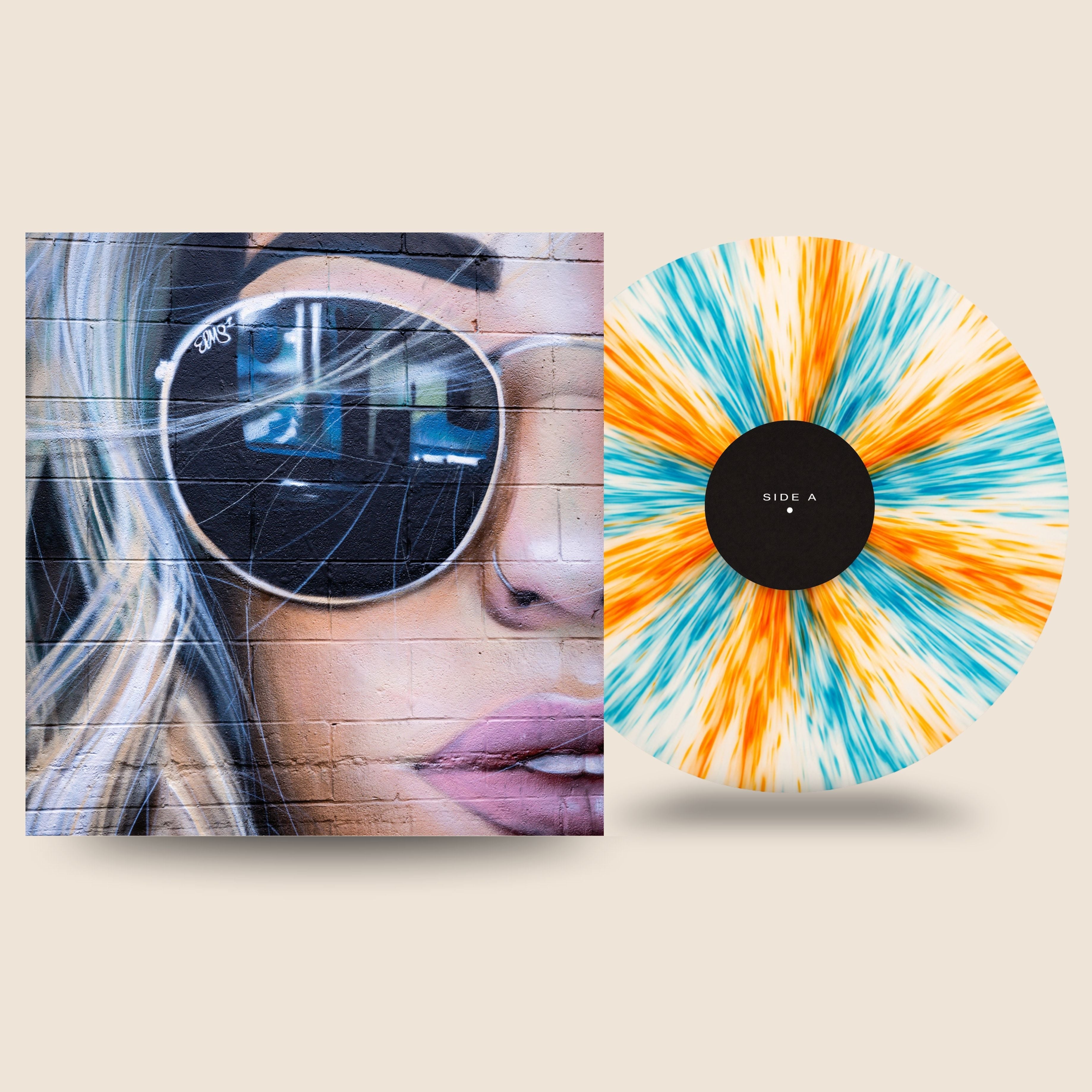 Artisan Series Paint Edition custom vinyl record by Black Label Vinyl featuring a vibrant teal, orange, and yellow painted-style 12-inch lathe-cut record, shown with full-color custom album artwork.