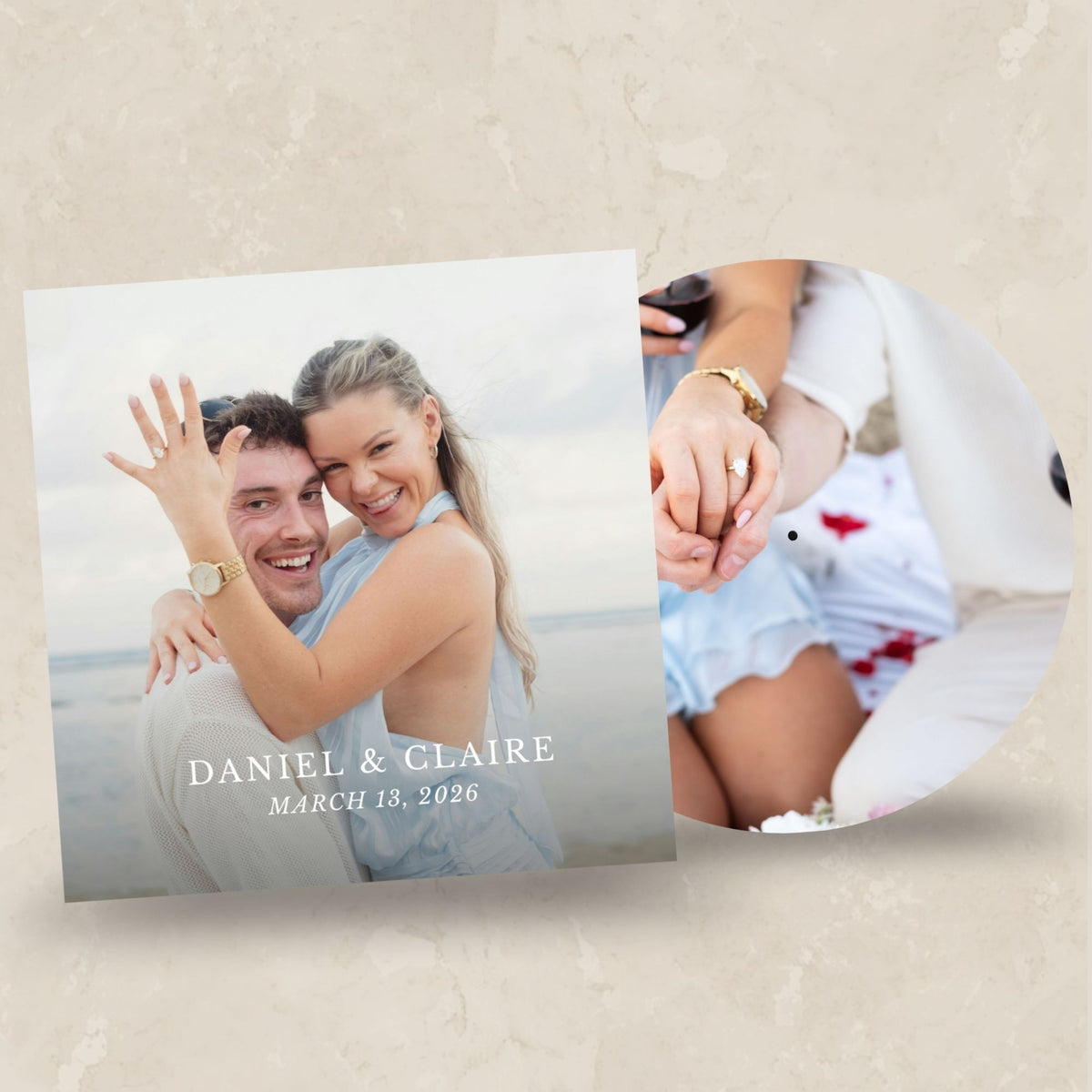 A custom square photo print and a round vinyl record sleeve featuring a couple's beach photo, displayed on a textured beige background. The photo print includes the text 'DANIEL & CLAIRE' and 'MARCH 13, 2096'.