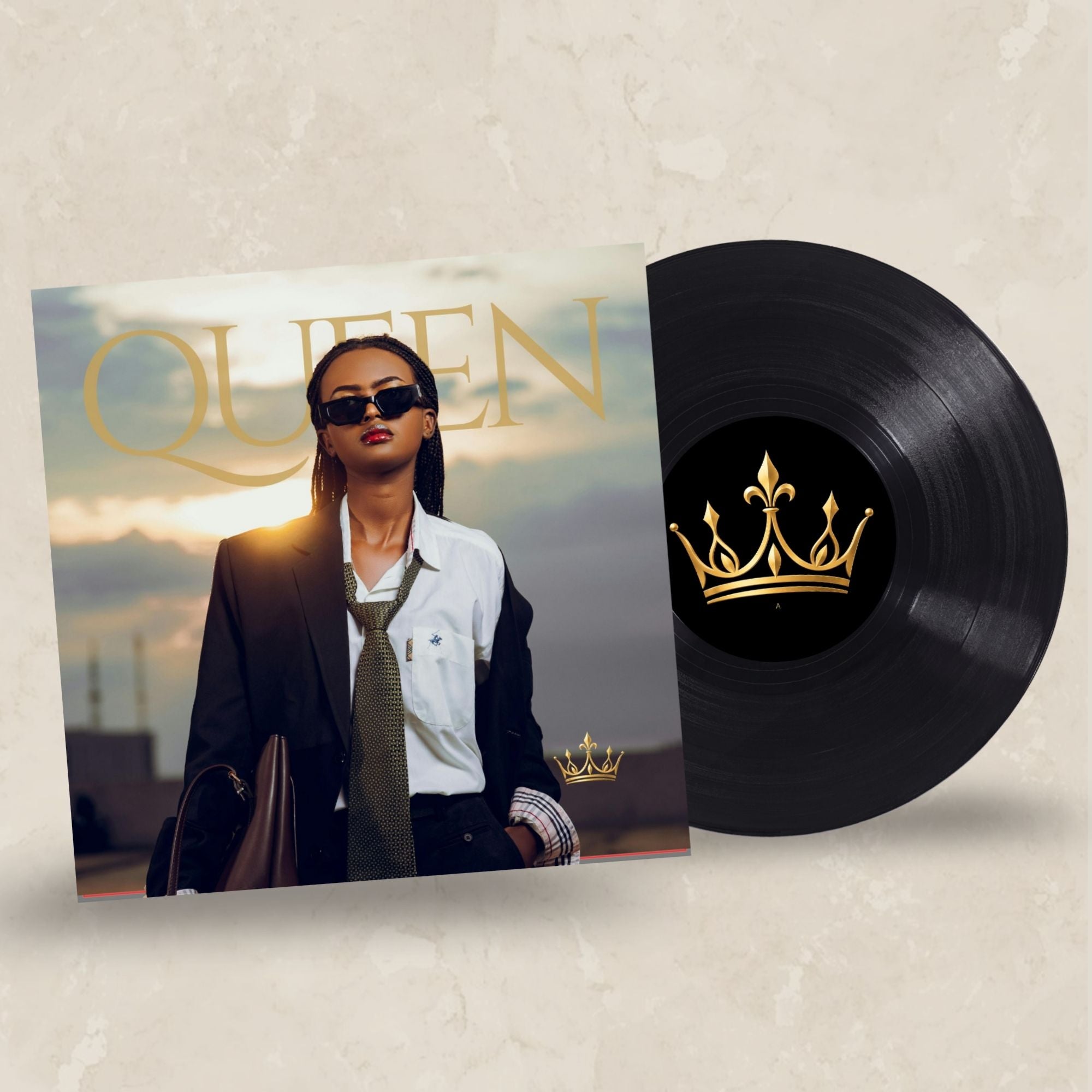 A vinyl record partially pulled from its sleeve, shown on a textured light beige background. The record is black with a gold crown emblem in the center label.