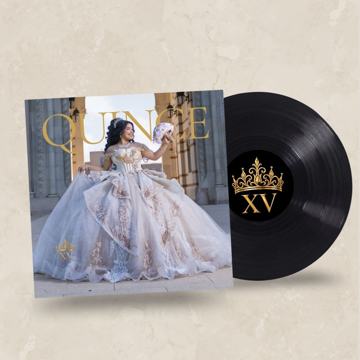 A vinyl record album with its cover art displayed on a textured beige background. The cover features a woman in an elaborate light blue and gold quinceañera gown, with the word 'QUINCE' in gold and 'XV' with a crown graphic on both the cover and the black vinyl disc.